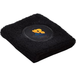 A black Terry Sport Wristband featuring a circular logo in the centre. Soft and made of terry fabric.