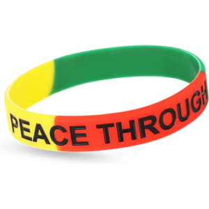 A silicone wristband featuring yellow, green, and red sections with the words "PEACE THROUGH" printed in black.