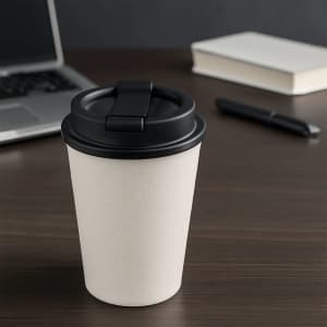 A drink bottle made of wheat straw, featuring a double wall design in a light colour with a black lid.