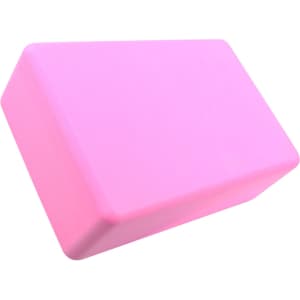 A pink EVA yoga block with a rectangular shape, featuring rounded edges and a smooth surface.