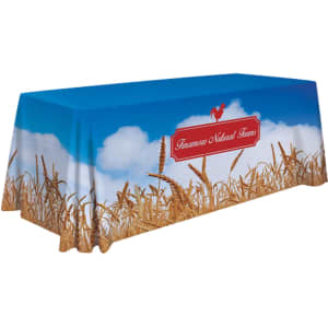 A blue 8ft table cloth featuring a wheat field design and a branding logo.