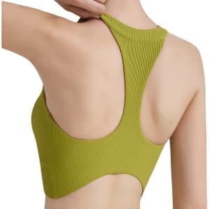 A women's zip-front racerback yoga crop bra tank in a vibrant green colour. Features a logo on the back.