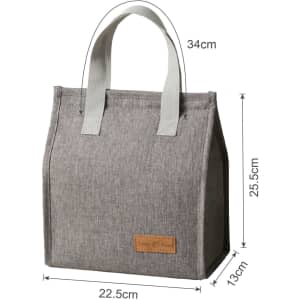 A grey minimalist lunch bag with white straps, featuring a logo and measuring 34cm in height and 22.5cm in width.