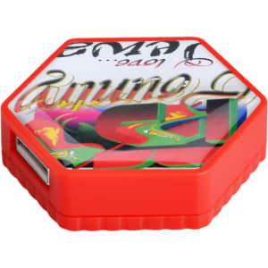 A hexagon-shaped flash drive in bright red, featuring a decorative design on the top and a USB port on the side.