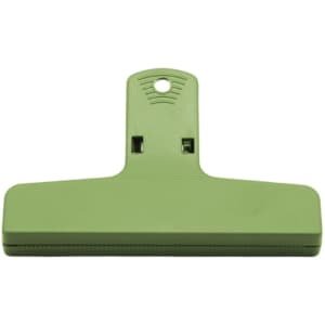 A green plastic clip with a flat base and a hanging hole for easy storage.