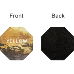 An octagonal frosted metal coaster in yellow on one side, with a black underside and a logo featured.