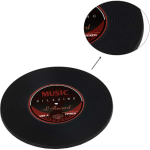 A black coaster designed to resemble a vinyl record, featuring a circular label in the centre and textured grooves.