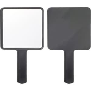 A handheld square mirror with a black handle and a reflective surface on one side and matte black on the other.