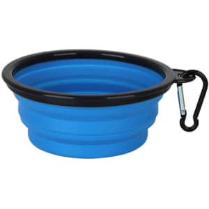 A collapsible silicon bowl in blue with a black rim and a clip for easy attachment.