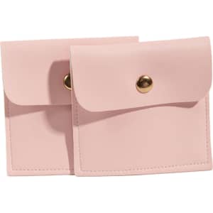 A pair of square, pink PU leather jewelry pouches with a snap closure and decorative gold button.