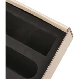 A beige subscription box with a black interior, featuring two compartments for product organisation.