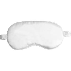 A white satin sleep mask with elastic straps for comfort, featuring a logo on one side.
