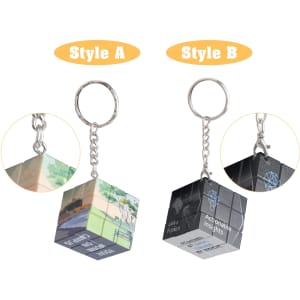 A pair of colourful 3x3 puzzle cube keyrings in two different designs, attached to metal keychains.