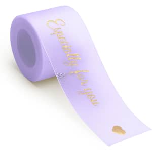 A roll of lilac organza ribbon with gold text reading "Especially for you" and a small heart design.
