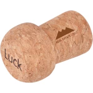 A cork-shaped flash drive in natural cork colour, featuring a logo and the word "Luck."