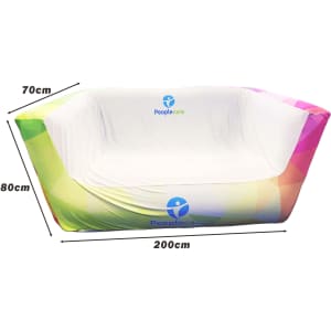 An inflatable two-seat sofa in a gradient of colours, featuring a white interior and a logo on the side.