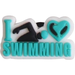 A teal and white Clog Shoe Charm featuring the text "I ❤️ SWIMMING" with a swimmer graphic.