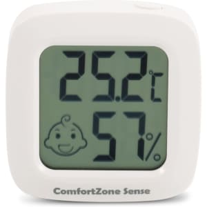 A white mini digital thermometer displaying temperature and humidity levels on a clear screen, featuring a baby face icon.