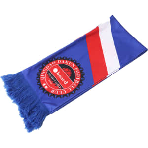 A knitted polyester scarf in blue with red and white stripes, featuring a logo in the centre and tasselled ends.