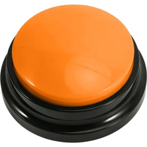 An orange button with a glossy finish, set on a black base. The button is round and prominent.