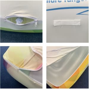 An inflatable lounge chair with various sections, featuring an air valve, a Velcro strap, and multicoloured design elements.