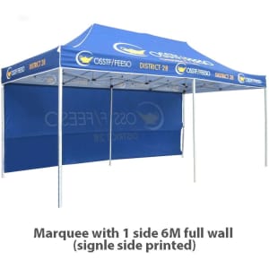 A large blue marquee with a 6M full wall, featuring logos and branding.