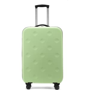 A collapsible suitcase in light green with a textured surface and dual wheels for easy mobility.