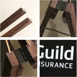 A-frame chalkboards in a dark brown wood finish, showcasing different angles and a metal hinge detail.