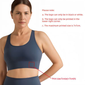 A women's cross back yoga crop bra tank in navy blue, featuring a small logo placement guideline.