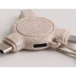 A 3-in-1 wheat straw data blocker with keyring in a speckled beige colour featuring USB connectors.