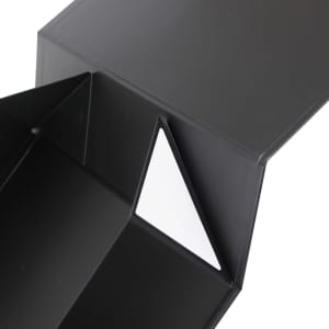 A medium foldable magnetic box in black with a white interior triangle. Features a logo on the exterior.