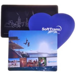 A heart-shaped purple mouse mat and two rectangular mouse mats with colourful images and a skyline design, featuring a logo.