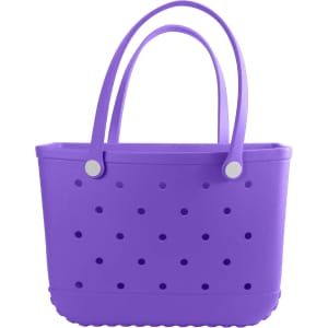 A purple EVA beach bag with perforated sides and two handles. The design includes rounded edges.