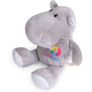 A grey hippopotamus plush toy with a friendly expression and a colourful logo on its body.