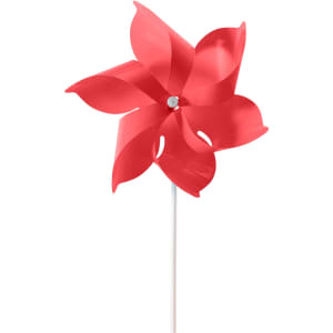 A red six-leaf pinwheel with a white stick, featuring cut-out designs in the leaves and a central hub.