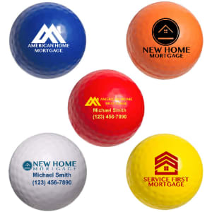 A set of five golf ball-shaped stress relievers in white, orange, red, yellow, and a textured design with logos.