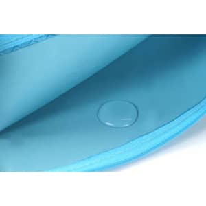 An open blue Zip Bag featuring a smooth interior surface with a small water droplet visible.