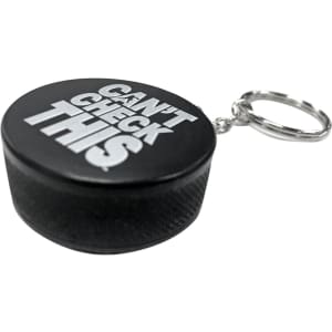 A black keyring shaped like a hockey puck with a silver keychain and decorative text on the surface.