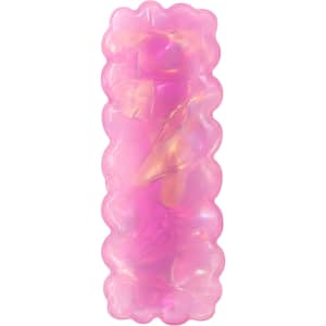 A wavy rectangle hair clip in iridescent pink, featuring a glossy finish with swirling colours.