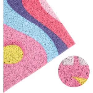 A colourful PVC Spiraloop Logo Mat featuring pink, blue, purple, and yellow wave patterns. Includes a detailed close-up section.