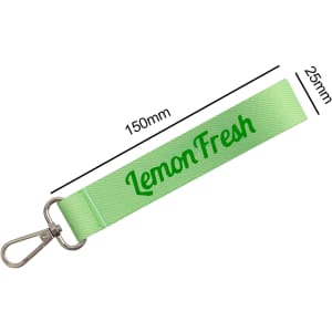 A green sublimation keyring with a metal clasp, featuring a logo printed on the strap. Measurements included.