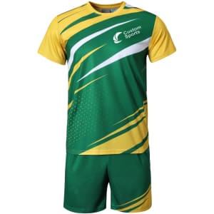 A green and yellow sublimated sports tee shirt with a logo, featuring dynamic patterns and matching shorts.