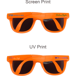 Two pairs of orange folding sunglasses with different printed designs on the frames. One has a logo.