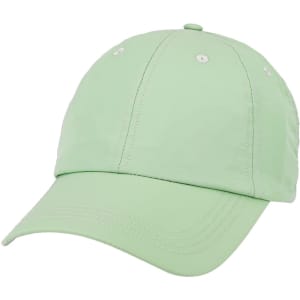 A lightweight cap in a soft green colour with a curved brim and eyelet vents. It features a logo.
