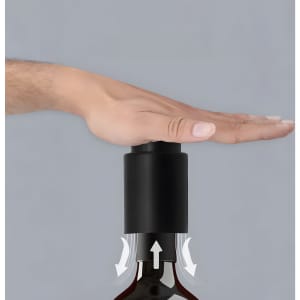 A drink bottle with a black push-type wine stopper, featuring an integrated scale on top.