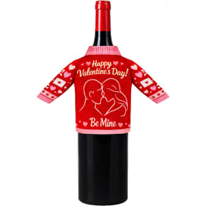 A drink bottle dressed in a red and pink knitted sleeve with a couple silhouette and heart motifs.