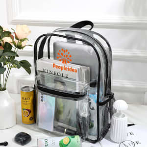 A transparent backpack in black with various items inside, including a laptop, books, and stationery.