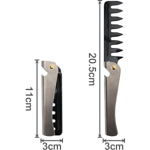 A folding comb in silver and black, featuring a compact design with measurement markings.