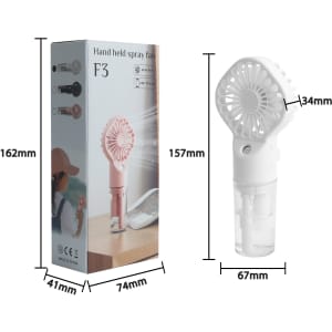 A handheld spray fan, featuring a white fan and a transparent water reservoir, displayed with its packaging.