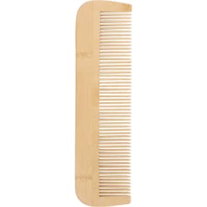 A fine-tooth bamboo comb in a light beige hue, featuring evenly spaced teeth and a smooth finish.